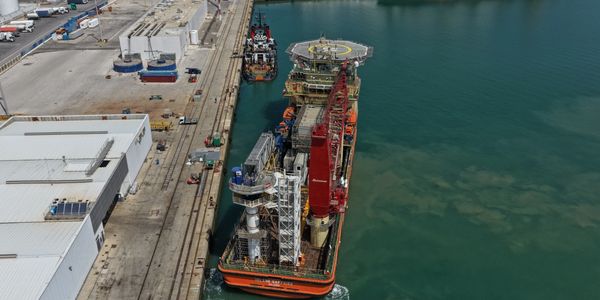 Aerial view offshore supply vessel docked at port